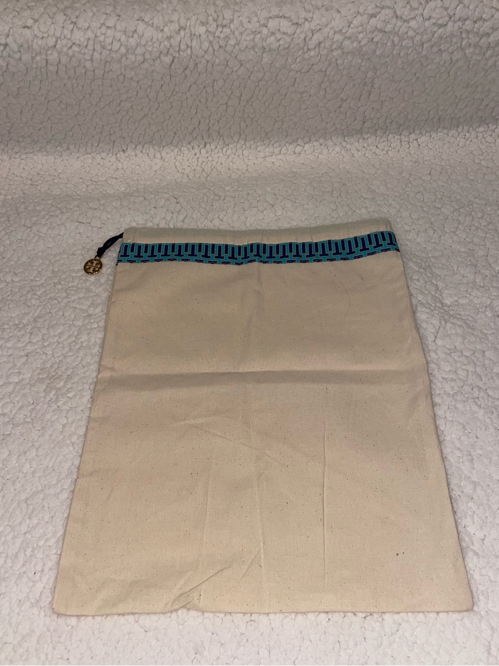 Tory Burch Cream Canvas Pouch with Teal and Navy Trim with Gold Charm
